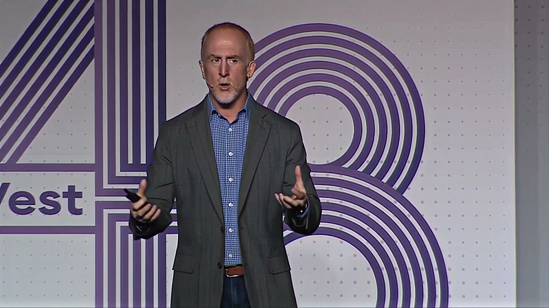 Pete Smith onstage in his speaker reel